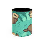 Aqua ceramic coffee mug with a cute otter pattern. My Positive Perspectives.